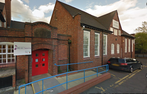 Out of school teacher with guitar