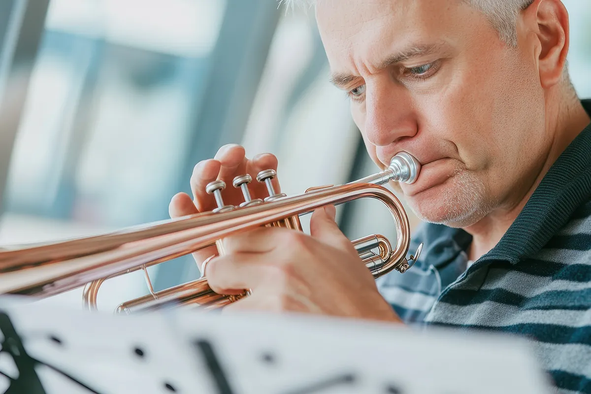 man playing trumpet